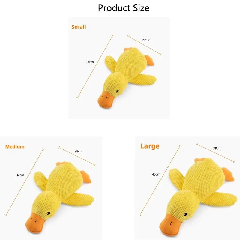 Dog sleeping with a dog hug duck toys to relieve boredom of little